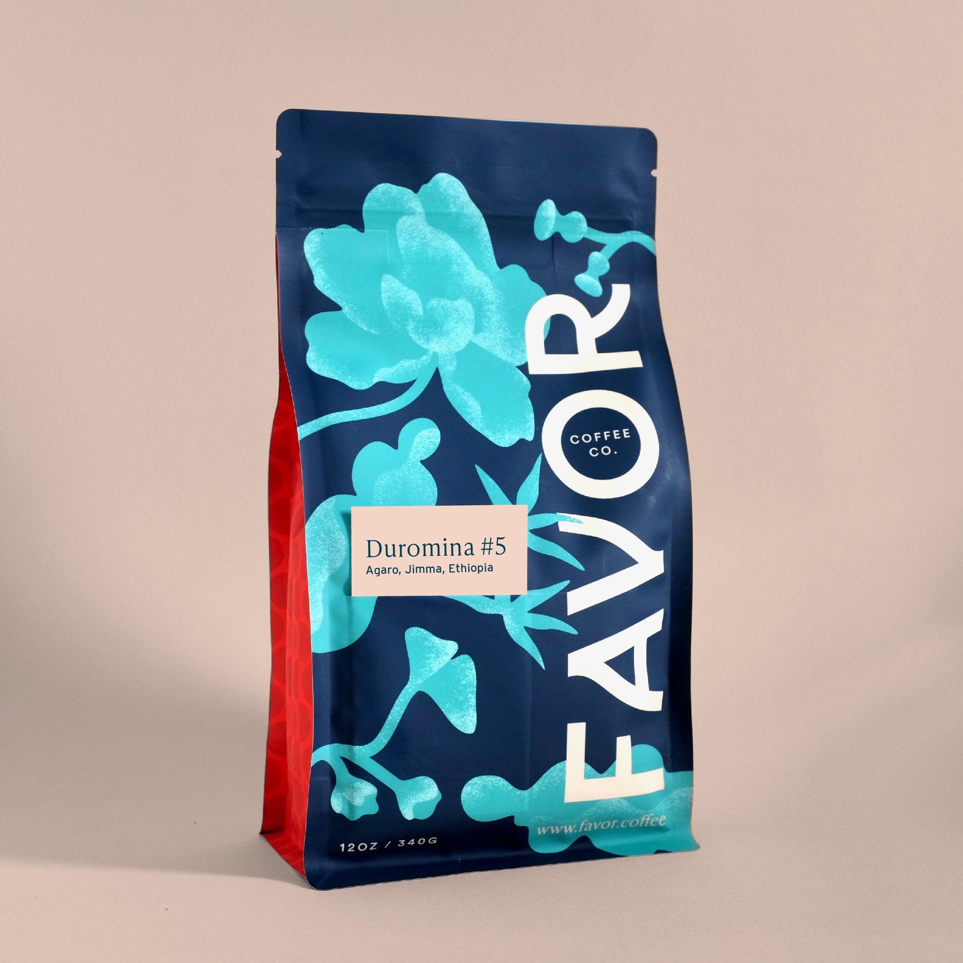 Coffee bag with blue floral design and 'FAVOR Coffee Co.' branding on a beige background. Tag reads Duromina #5, Agaro, Jimma, Ethiopia